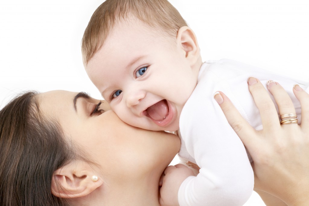 Laughing Baby Playing With Mother